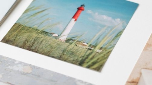 A bunch of different pictures on a wall