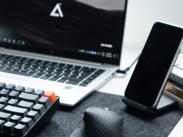black and white computer keyboard beside black ipad