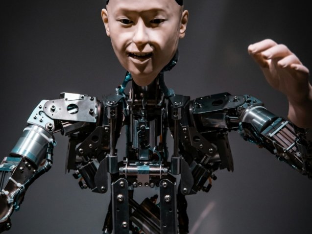 man in black and gray suit action figure