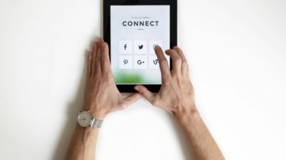 person using black iPad