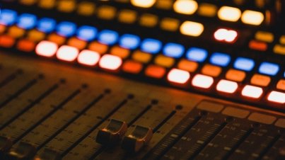 shallow focus photography of audio mixer