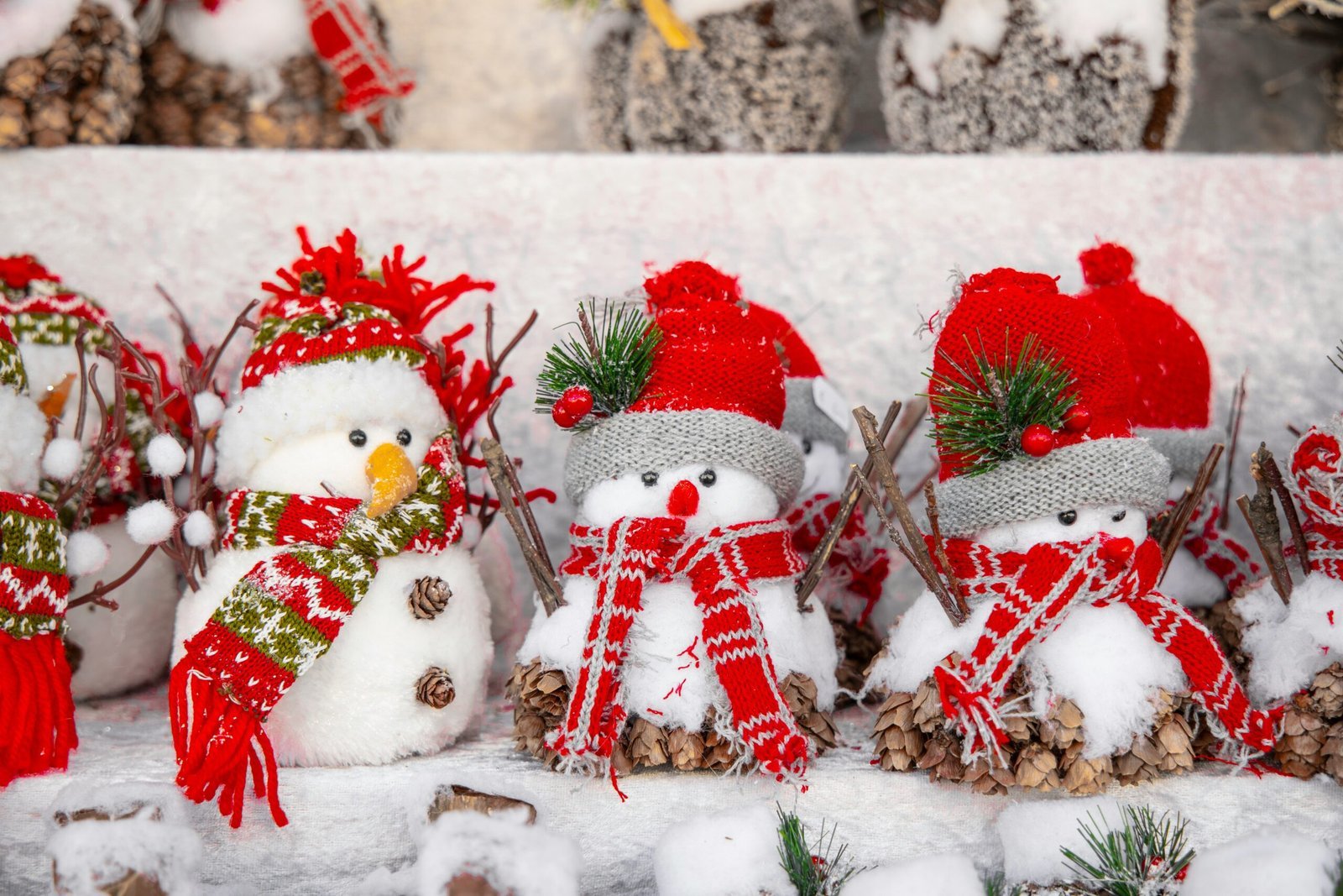 white snowman with red and green christmas baubles
