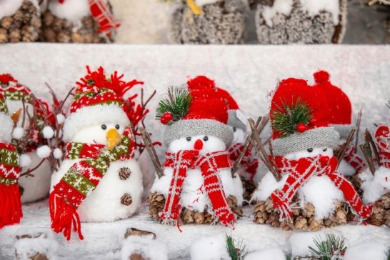 white snowman with red and green christmas baubles