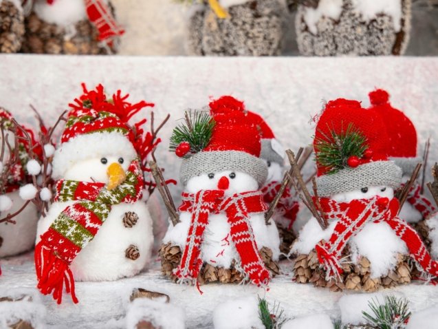 white snowman with red and green christmas baubles
